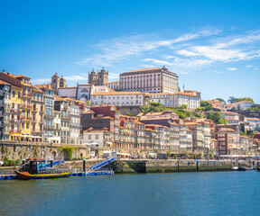 The Ribeira district of the  old city of Porto with its medieval Cathedral in the background. Porto...