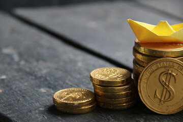 Golden coins on vintage background.