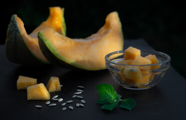 Fresh melon on the table in the garden