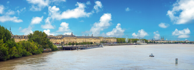 Panoramic view of the long water front promenade of the city of Bordeaux along the Garronne river,...