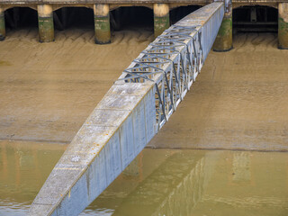 interesting old ship gangaway over the waters of the Thames estuary in Tillbury, England