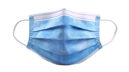 A close up view of a light blue surgical mask with white elastic bands on a black background