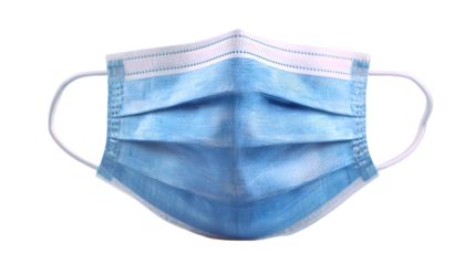 A close up view of a light blue surgical mask with white elastic bands on a black background