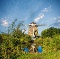 Ancient windmill in the outskirts of Amsterdam, Hollnad, the Netherlands