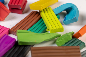 green plasticine, the material is used for various purposes and teaching children
