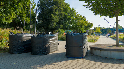 Blocked access to an event venue, road closed with barriers and warning signs, outdoor event safety