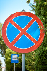 No stopping road sign on a sunny rural roadside