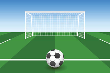 Illustration of a soccer ball on a striped green field, placed on the line ready for a shot towards the net. A blue sky is visible in the background. 