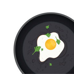 Overhead shot showing a fried egg in a black pan. Bright yellow yolk, cooked egg whites, and parsley garnish. Breakfast scene of a simple, prepared meal.