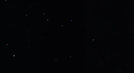 Night sky with scattered colorful stars and celestial bodies creating minimalist astronomy background for space-themed designs