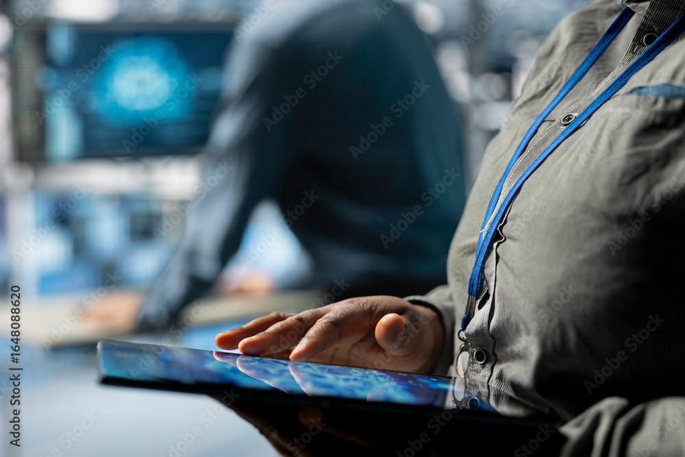 Poster close up of server farm it expert using tablet to improve deep learning ai systems workloads. data c