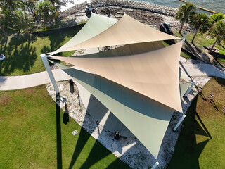 An aerial view of a pavilion shade trap at a city park.