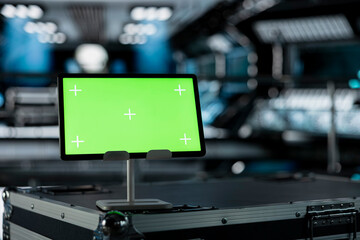 Close up of green screen mockup tablet in spacecraft on top of cargo container. Chroma key isolated screen device in futuristic spaceship during deep space mission operations