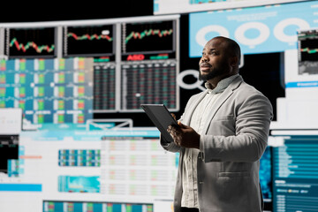 African american entrepreneur contemplating about a new strategy to increase the company profit...