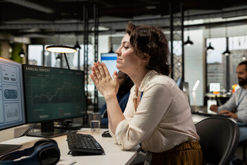 Financial consultant celebrating live forex trends improvement, progress and achievement in...