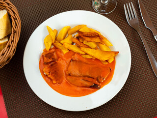 Typical Spanish dish: tuna stew in tomato sauce with potatoes