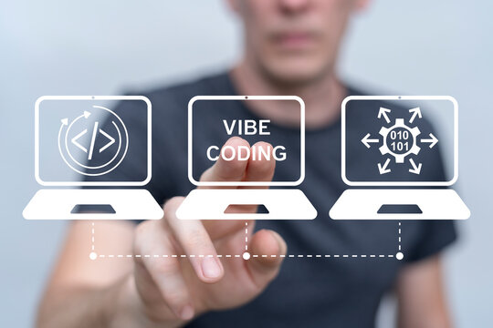 Developer using virtual touch screen presses inscription: VIBE CODING. Vibe coding artificial intelligence programming futuristic information technology concept.