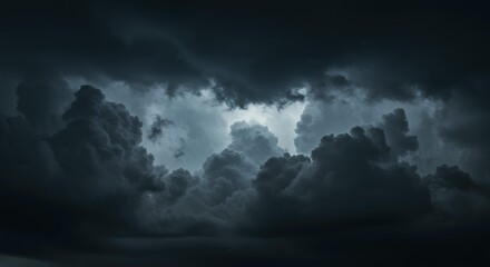 Obraz premium Dramatic stormy sky with heavy dark clouds and atmospheric lighting creating moody weather background for climate themes