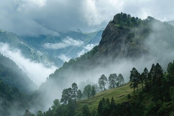 Misty mountain scenery with clouds