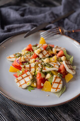 Salad with mozzarella cheese and oranges. 