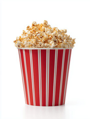 Striped red popcorn bucket filled with popcorn on solid white background
