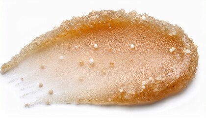 beige salt or sugar scrub swatch on a white background exfoliating body or facial peeling texture