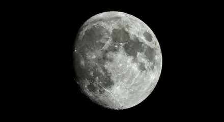 Naklejka premium Detailed full moon showing lunar craters and surface features against black space background for scientific and educational content