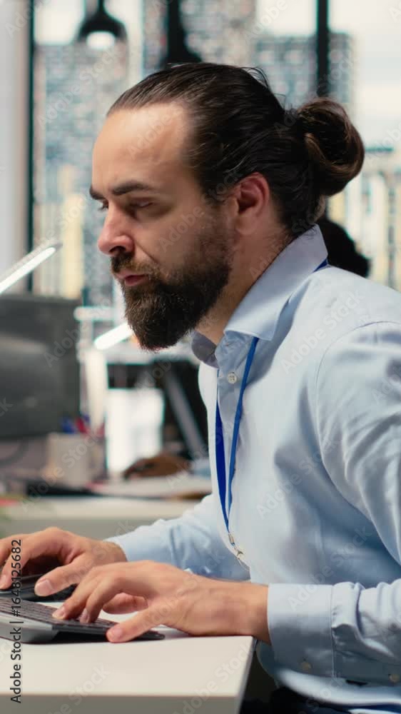 Poster vertical video sad portfolio manager in office dejected by negative stock market investment returns.