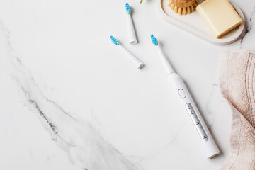  Ultrasonic toothbrush with replaceable heads. Electric toothbrush for dental health. Copy space