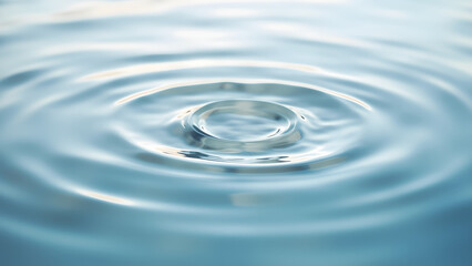 Ripple pattern on calm water surface, top-down view with high clarity and natural texture