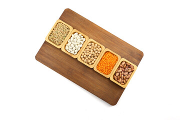 Different type of raw dry legumes composition.  lentils, red lentils, chickpeas and kidney beans....
