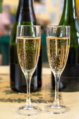 Pouring and tasting of dry sparkling wine brut, grand reserve, champagne in Ay-Champagne wine making village in Vallee de la Marne, , Champagne region, France