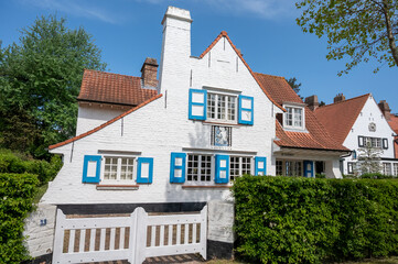 Cosy seaside holiday village on North Sea, built in belle epoque style in Flanders, De Haan or Le Coq sur Mer, Belgium