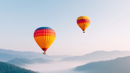 Colorful Hot Air Balloons Floating Above Misty Mountains at Sunrise in a Beautiful Landscape
