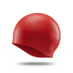 Red silicone swimming cap with textured grip dots floating on white background for competitive swimming equipment catalog
