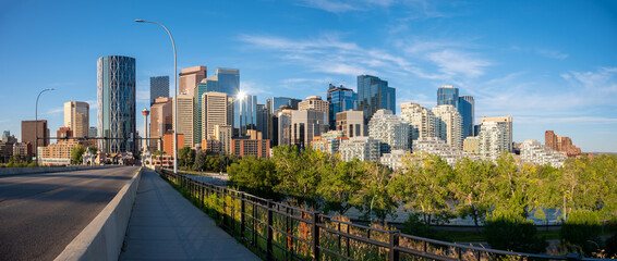 Calgary's skyline along the Bow River on a beautiful summer morning.