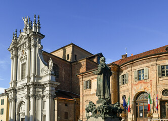 Church of Sant'Andrea, Palazzo Comunale (Town Hall Palace) and statue of Saint Giuseppe Benedetto Cottolengo, in Piazza Caduti per la Libert&agrave;, Bra (Cuneo), Piedmont, Italy