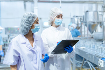 Food and manufacturing researchers oversee seafood production lines in tightly controlled factories...