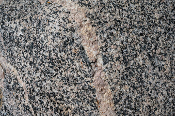 Stone texture and background. Gray surface of rough stone 