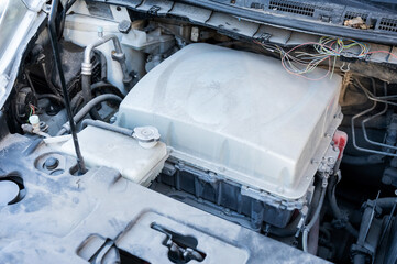 Electric motor under the hood of a car. 