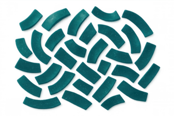 Turquoise candy pieces creating geometric arrangement against clear surface, highlighting sweet design element