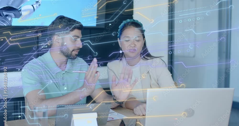 Poster software engineer gesturing stylus explaining designs to manager in meeting with animated circuits