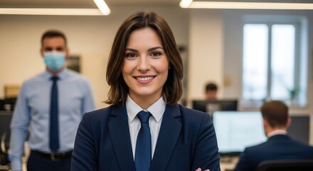 Professional Woman in Office: A portrait of an elegant businesswoman in a modern office setting, radiating confidence and professionalism, with colleagues in the background.