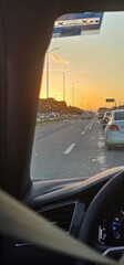Fototapeta premium Inside a car, sunset, traffec, lights at Tulum, mexico