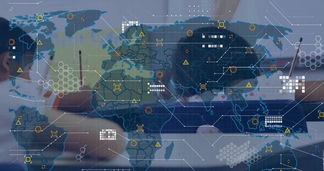 Girl and boy writing during education as teacher walking in and fading hex grid map overlay - Powered by Adobe