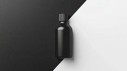 A sleek, black glass bottle with a dark cap sits on a diagonal black and white background, showcasing its minimalist design and potential for various product applications