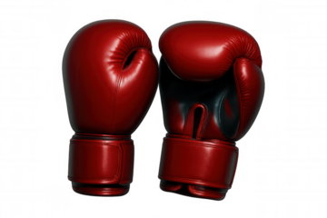 Red boxing gloves hanging against transparent backdrop, symbolizing competitive martial arts
