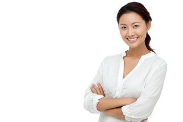 Confident young woman in casual white shirt smiling with crossed arms against a plain background