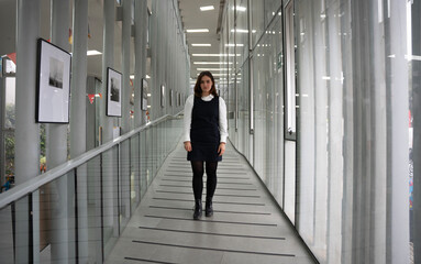 student walking on the escalator