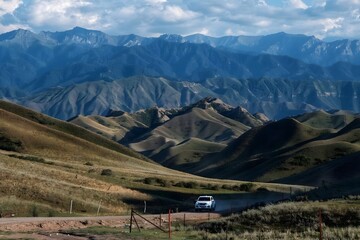 Breathtaking aerial view of Yizhao Highway revealing stunning mountain landscapes and serene wilderness in Xinjiang China